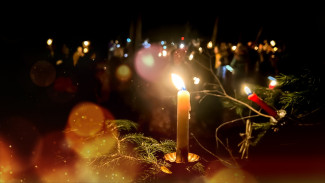 Brennende Kerze Waldweihnacht